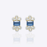 14K gold Noelle Bloom floral stud earrings with delicate detailing.