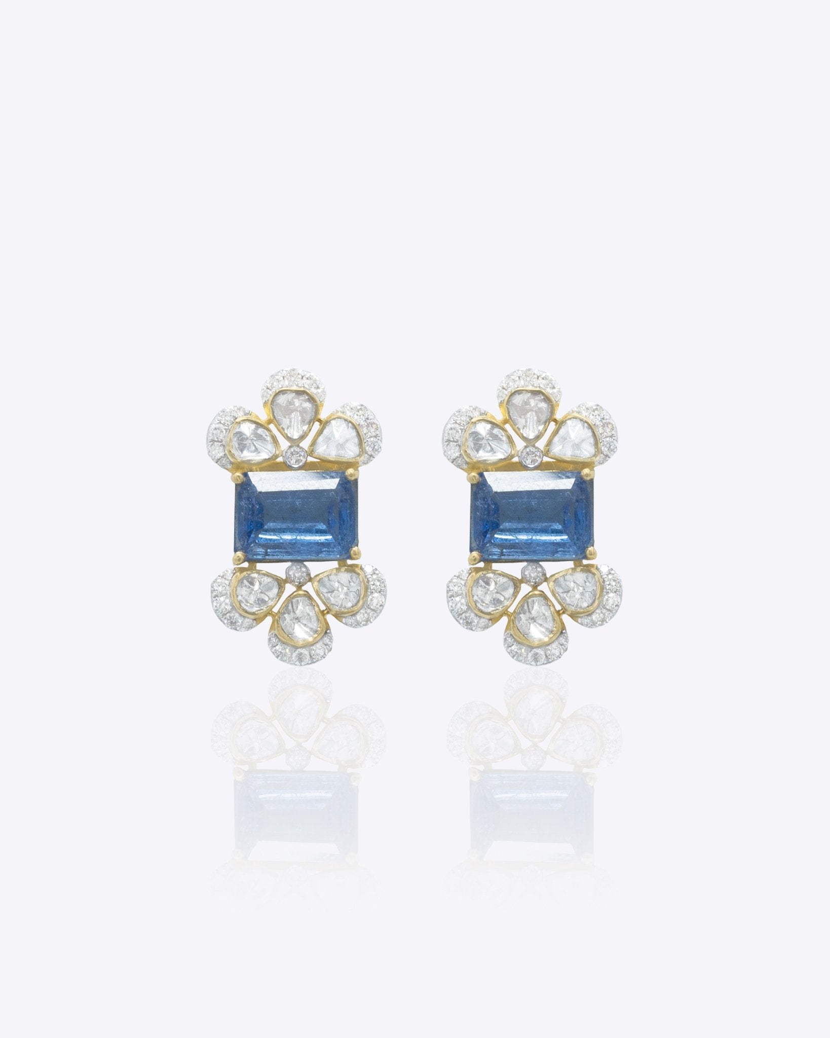 14K gold Noelle Bloom floral stud earrings with delicate detailing.