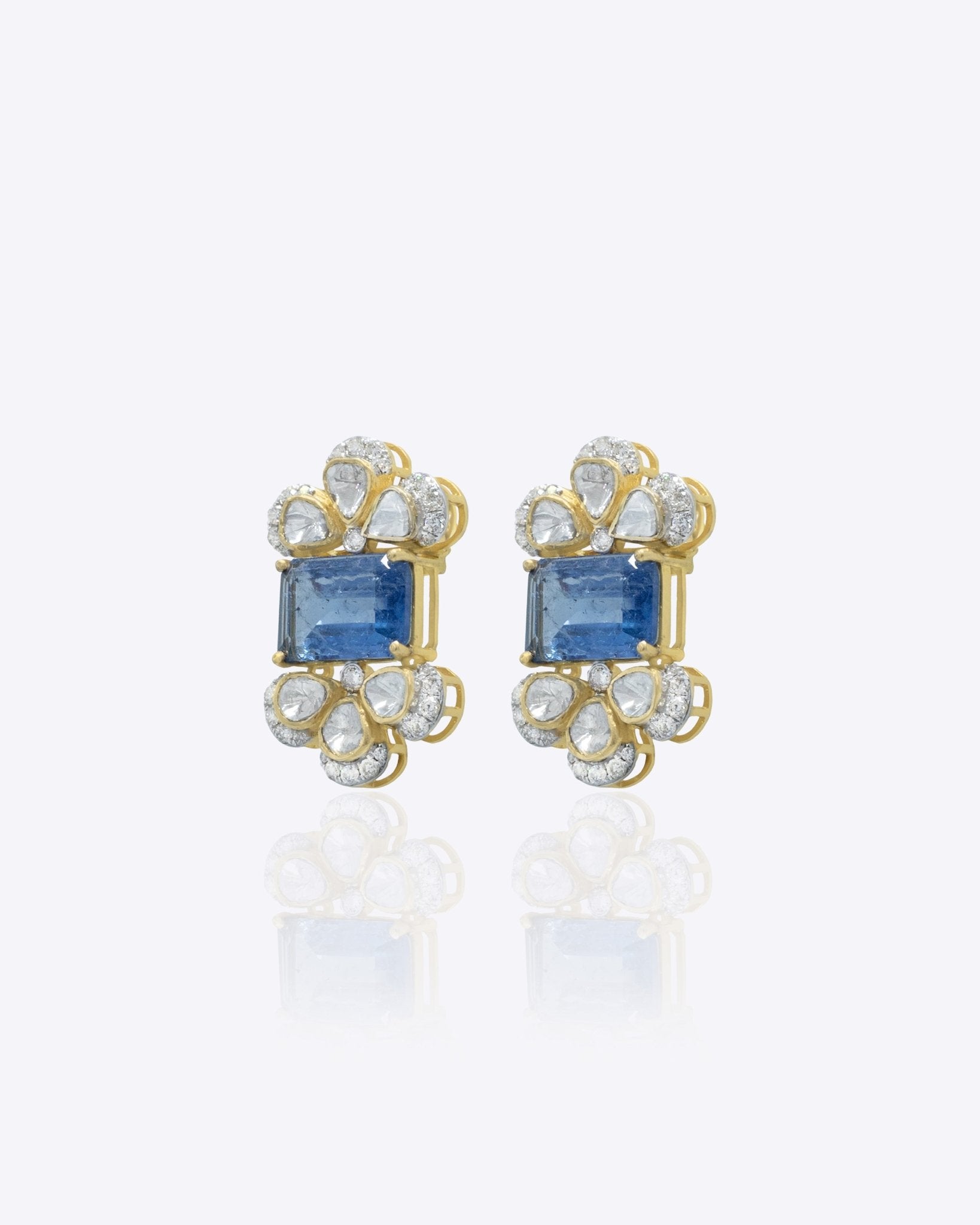 14K gold Noelle Bloom floral stud earrings with delicate detailing.