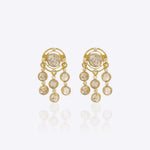 14K gold earrings with a luminous Polki stone and a cascade of shimmering drops
