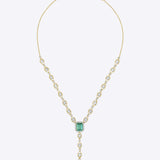 14K gold Oculis necklace with a central green stone and stacked Polki.