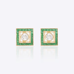 18k gold stud earrings with a Polki centerpiece and emerald halo