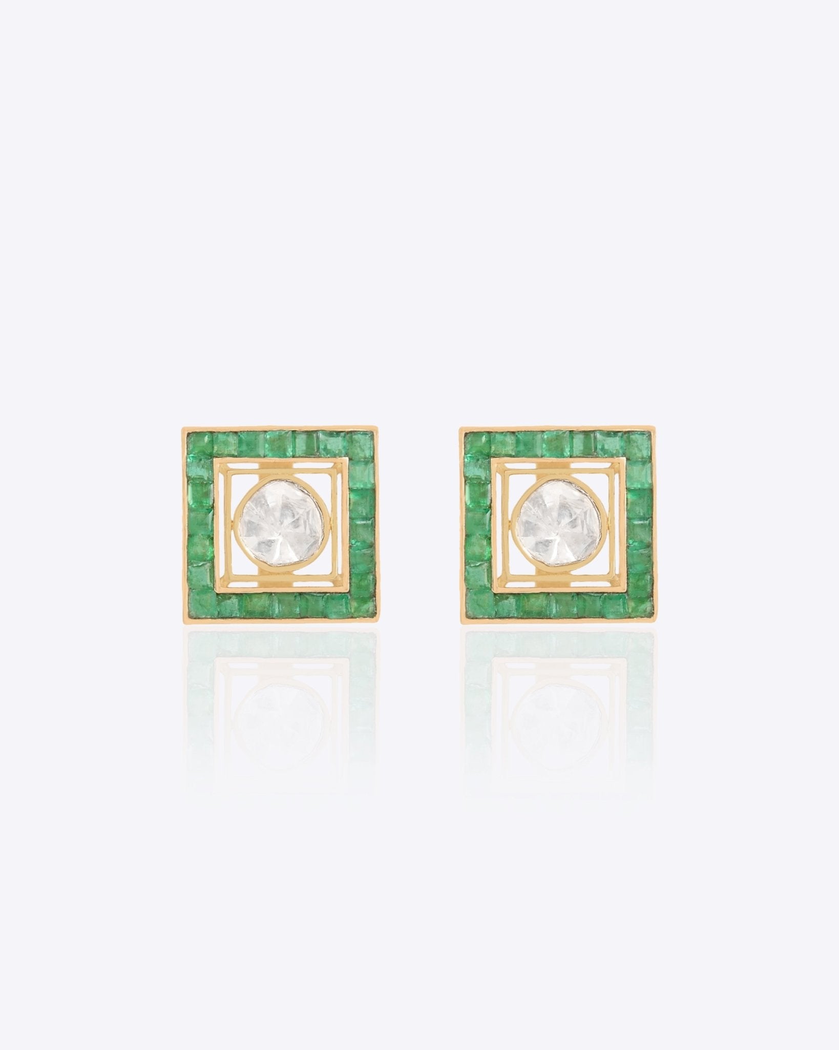 18k gold stud earrings with a Polki centerpiece and emerald halo