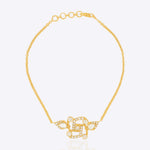 Swastik Sutra Bracelet in 14K gold with a Polki and diamond-outlined Swastik motif.