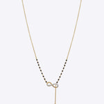 14K gold mangalsutra with a loop design and onyx detailing