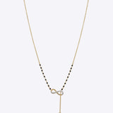 14K gold mangalsutra with a loop design and onyx detailing