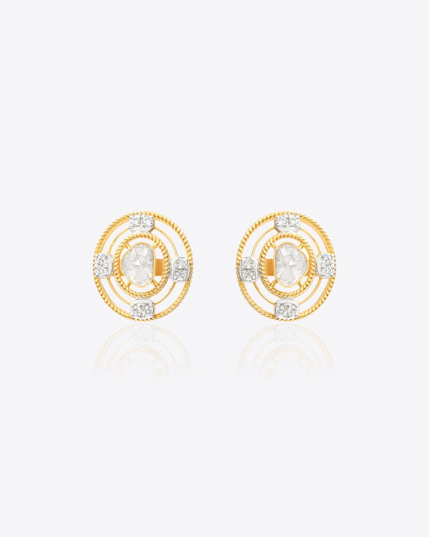 14K gold earrings with textured circular detailing and sparkling Polki diamonds
