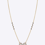 14K gold mangalsutra with round and oval Polki charms