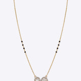14K gold mangalsutra with round and oval Polki charms