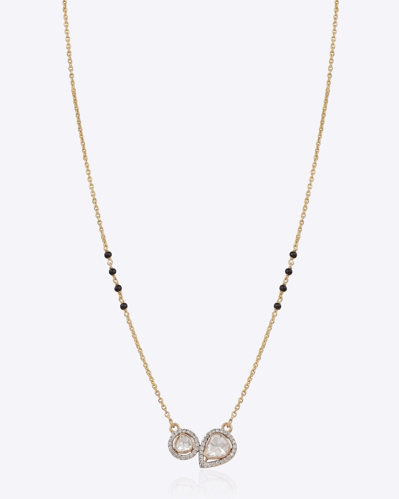 14K gold mangalsutra with round and oval Polki charms