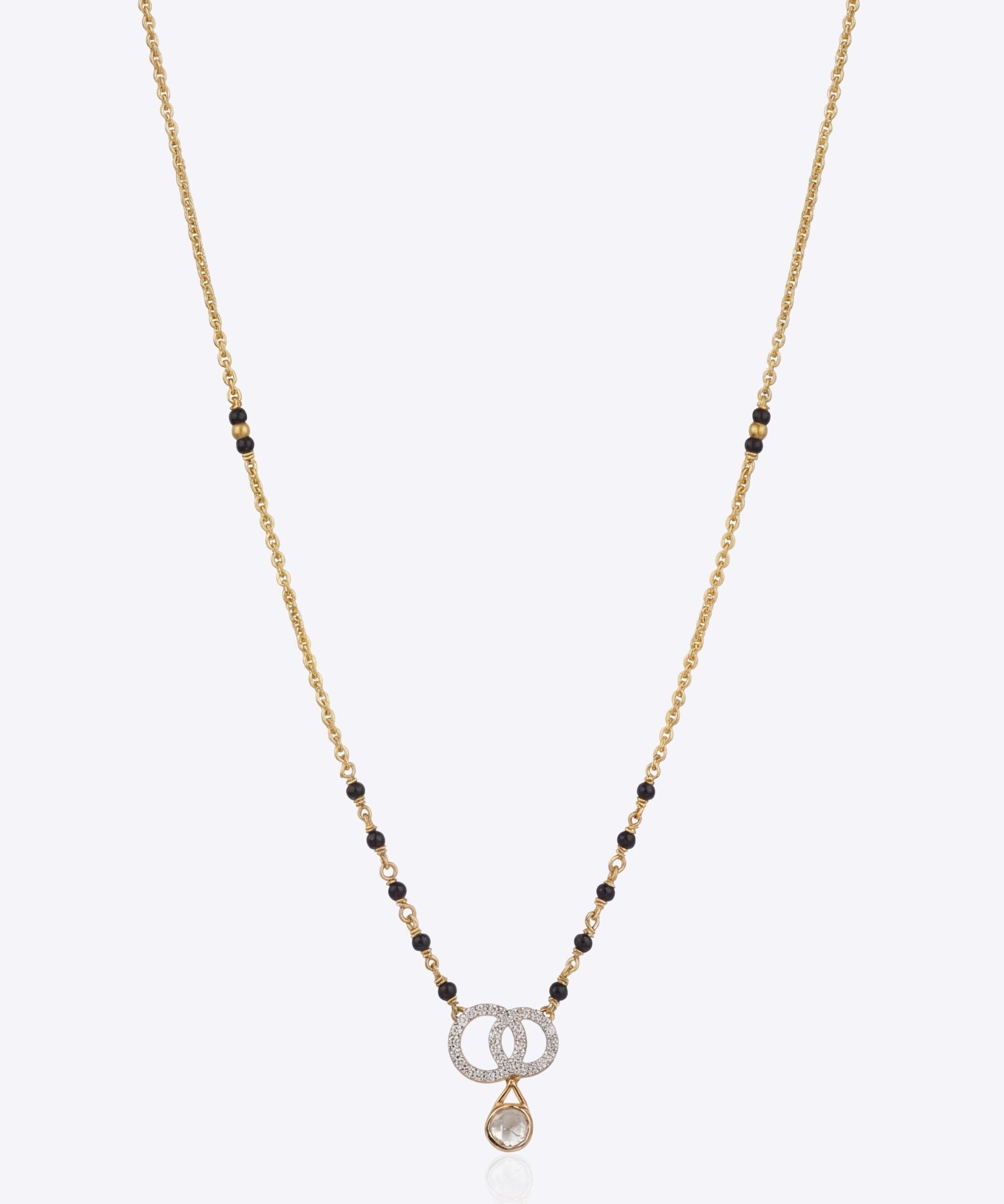Unified Loop Mangalsutra in 14K gold with overlapping loop design and onyx accents.