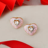 18K gold heart-shaped stud earrings with pink tones and Polki center