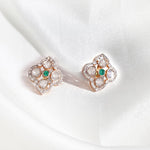 18K gold rhombus earrings with a Polki center and diamonds