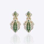 Zehra Drop Earrings in 14k gold with fluid drop silhouette and emerald accents.