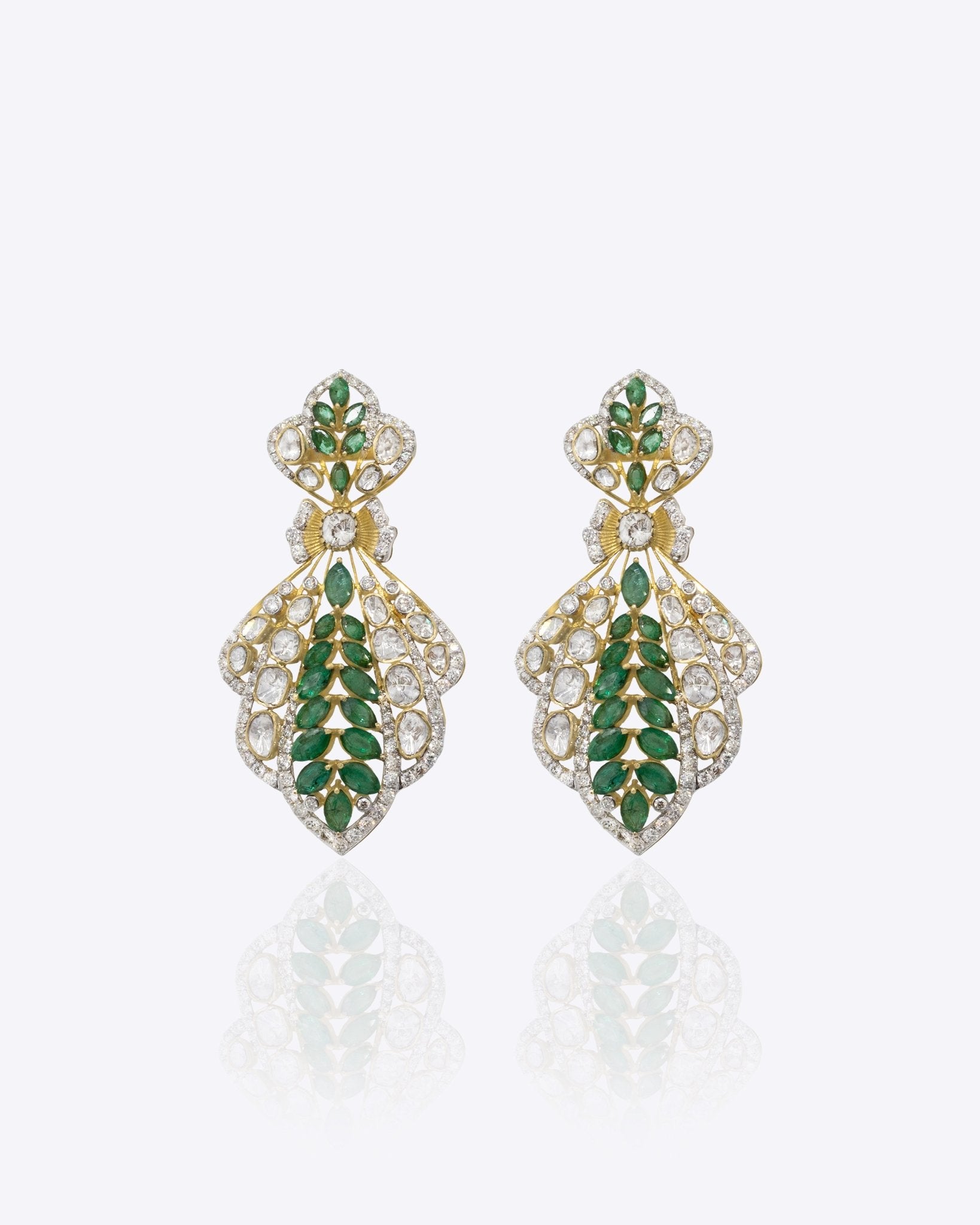 Zehra Drop Earrings in 14k gold with fluid drop silhouette and emerald accents.