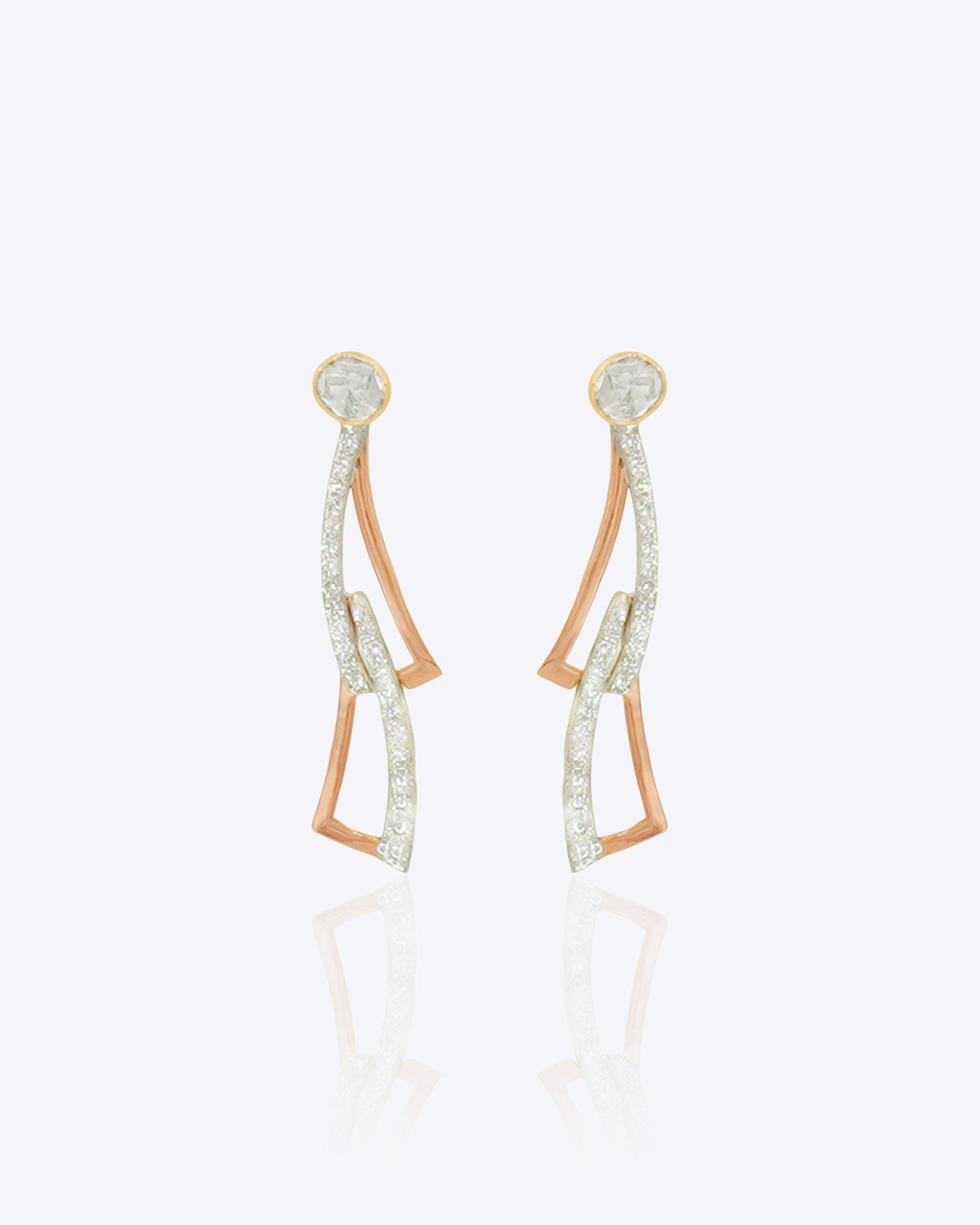 14k gold Orion Flow earrings with Polki, diamonds, in a celestial motif.