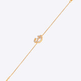 Veer Diamond Bracelet in 14K gold with Om motif and Polki diamond detailing.