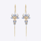 Floral Polki earpin in 14K gold with a bold, sculptural horned detail.
