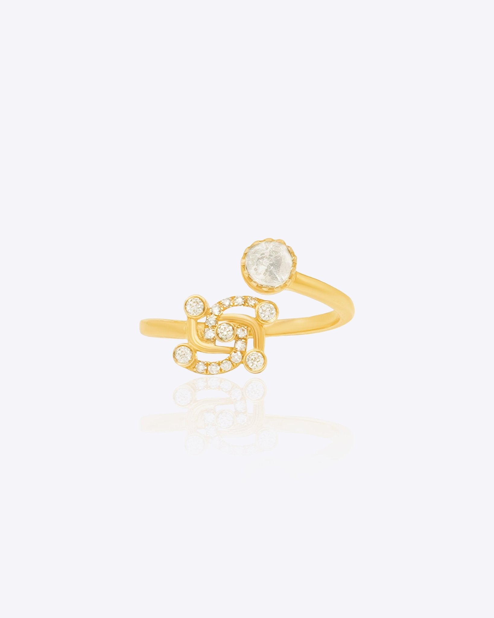 Swastik Sutra Ring in 14K gold with a Polki and diamond-studded Swastik motif.