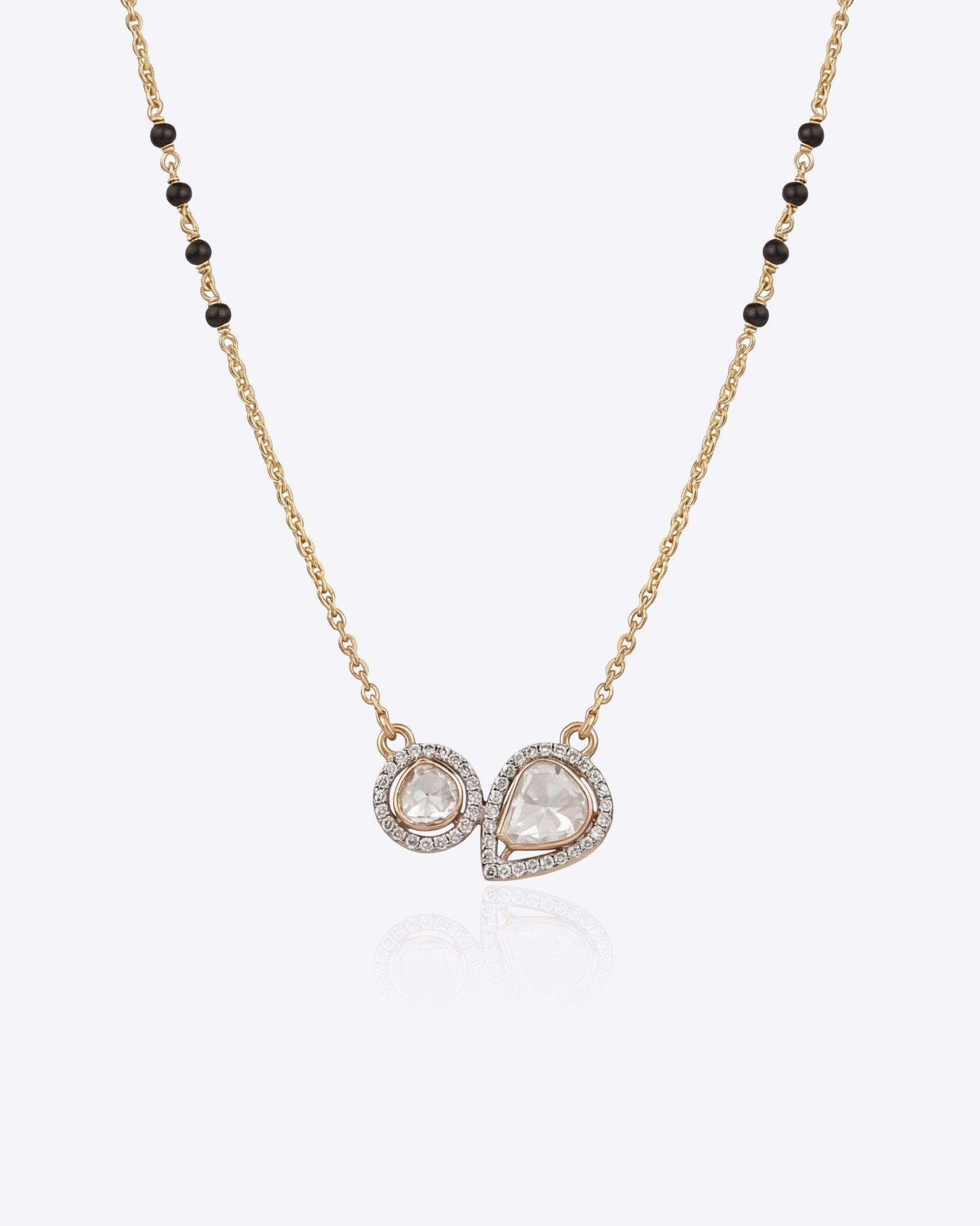 14K gold mangalsutra with round and oval Polki charms