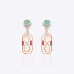 14K gold drop earrings with Polki diamonds and emeralds in a cascading design.