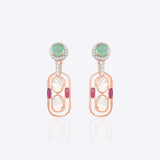14K gold drop earrings with Polki diamonds and emeralds in a cascading design.