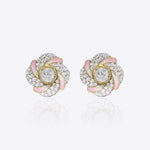 14k gold floral stud earrings with a soft pink hue