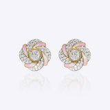 14k gold floral stud earrings with a soft pink hue