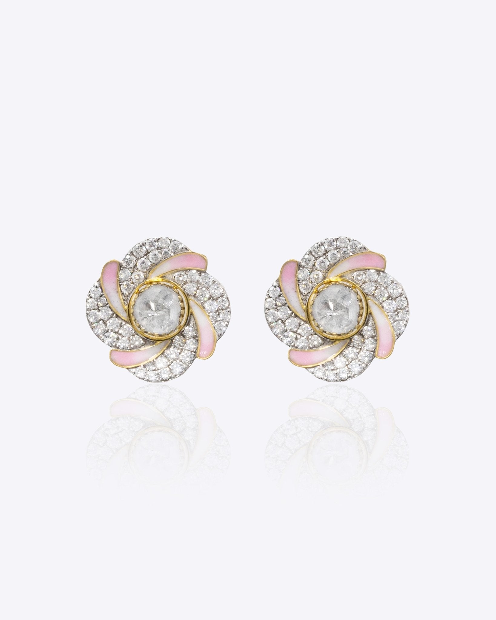 14k gold floral stud earrings with a soft pink hue