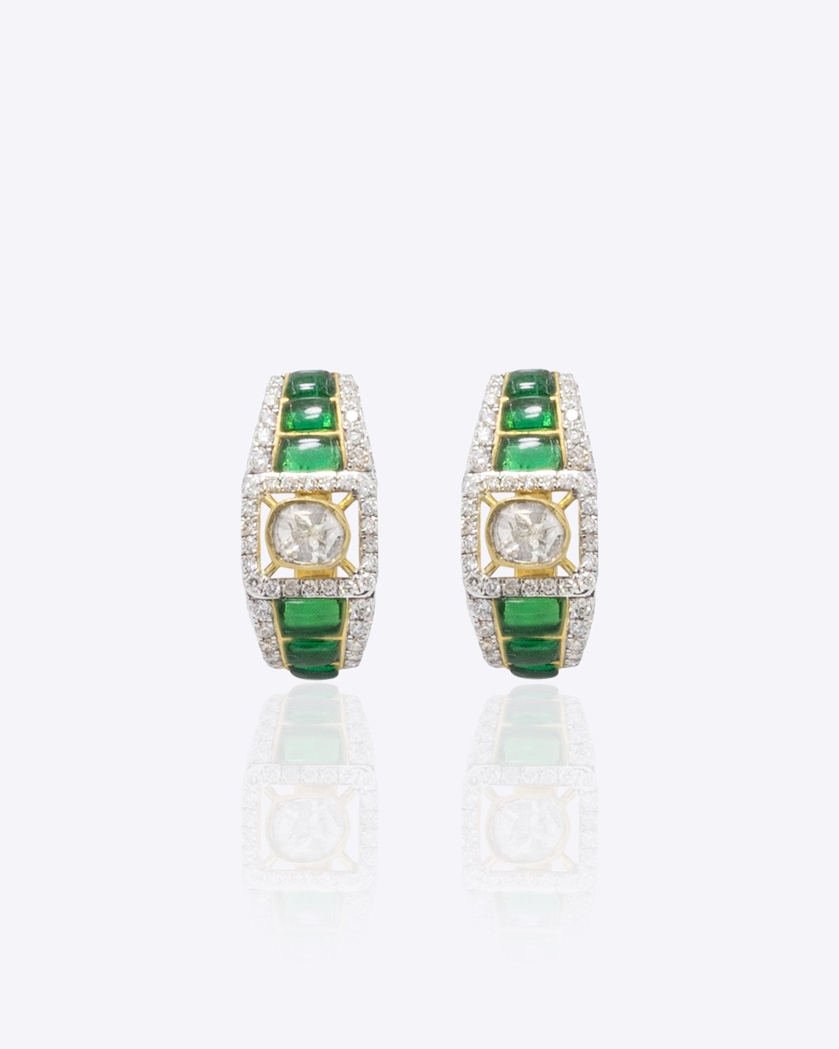 14K gold hoop earrings with a striking central Polki diamond.