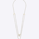 Layered Polki necklace in 14K gold with a softly tiered, minimalist silhouette.