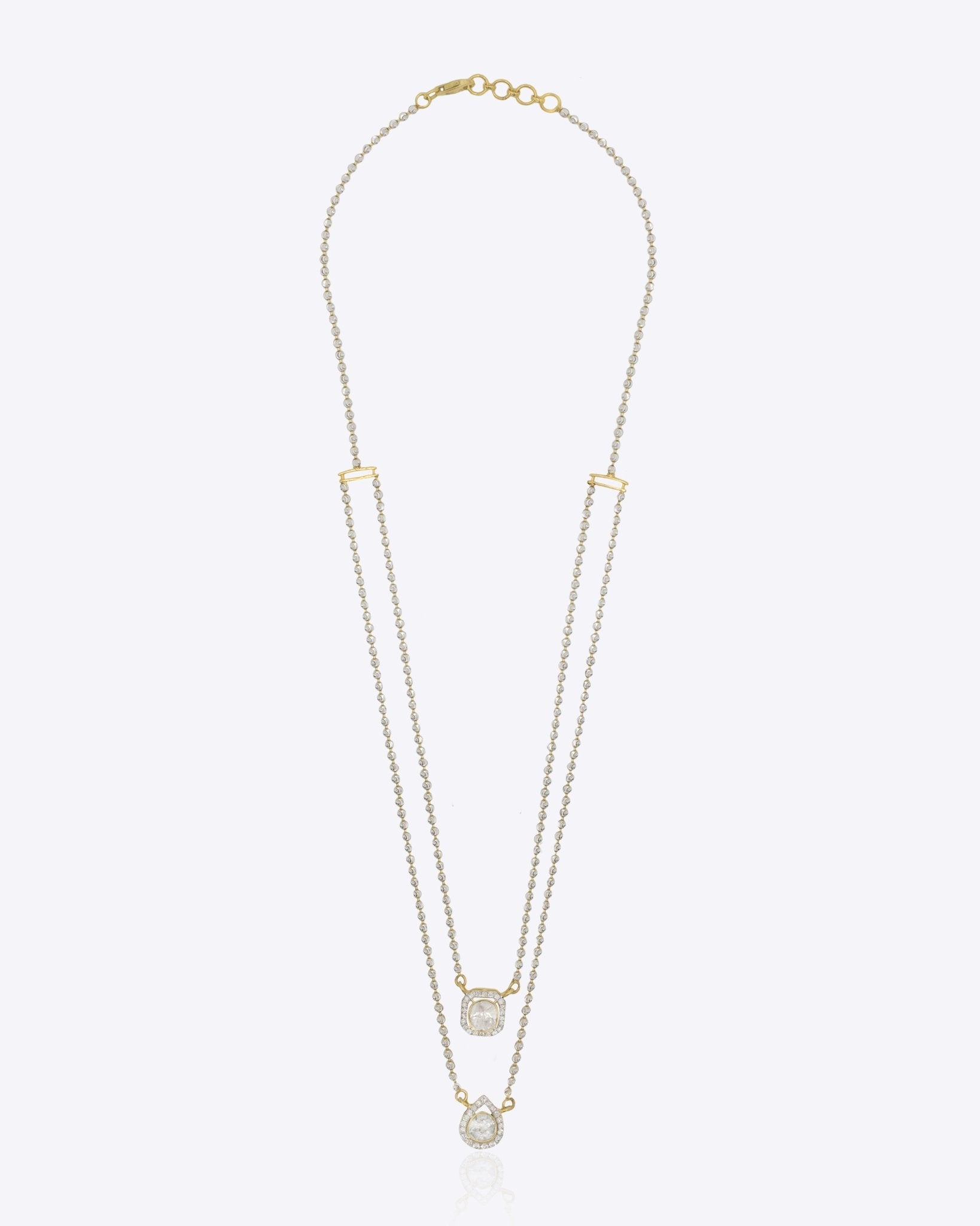 Layered Polki necklace in 14K gold with a softly tiered, minimalist silhouette.