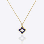 9kt gold pendant with deep blue enamel in a delicate charm shape