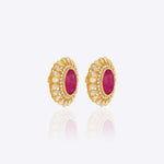 14k gold stud earrings with ruby center and uncut diamond halo