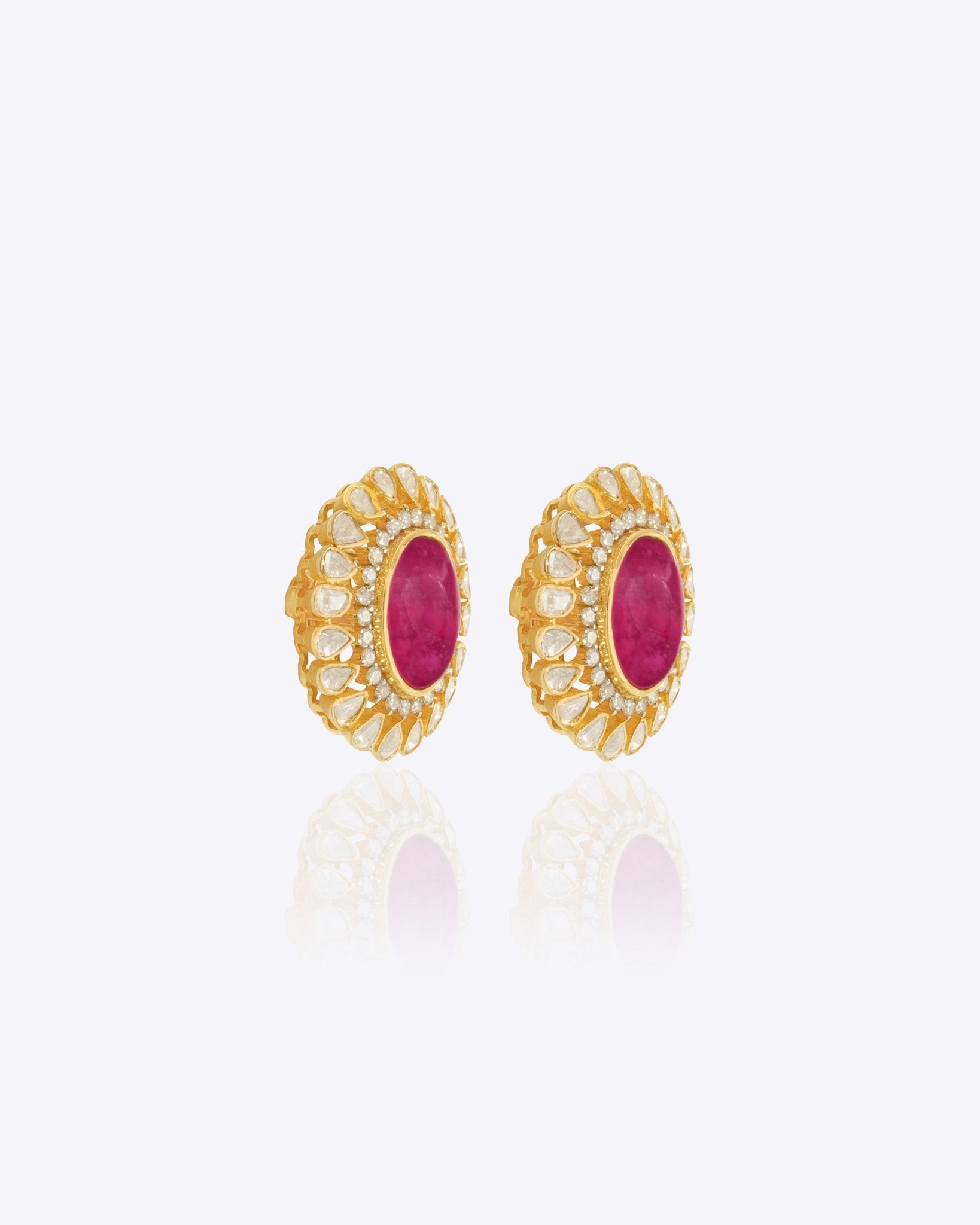 14k gold stud earrings with ruby center and uncut diamond halo