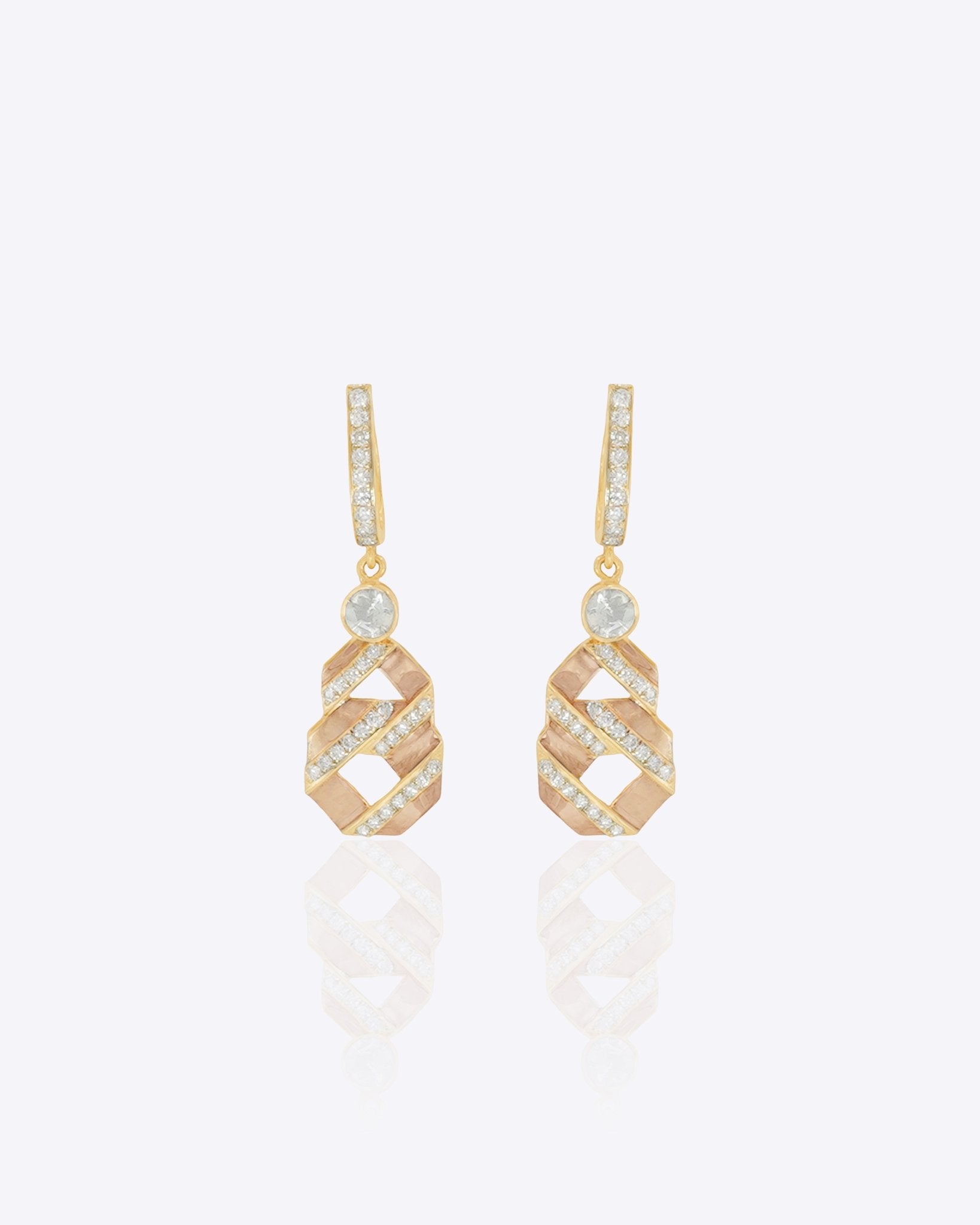 14K gold Nova Hexa earrings with a hexagonal motif, Polki, and diamonds.