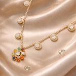 18K gold Navratna Bloom necklace with a radiant bloom and delicate drops.