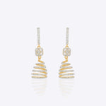 14k gold spiral earrings with Polki diamonds in a sculptural helix design.