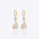 14k gold spiral earrings with Polki diamonds in a sculptural helix design.