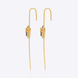 14k gold Mystic Wing earpins with Polki, diamonds, and tanzanite in a butterfly-wing design.