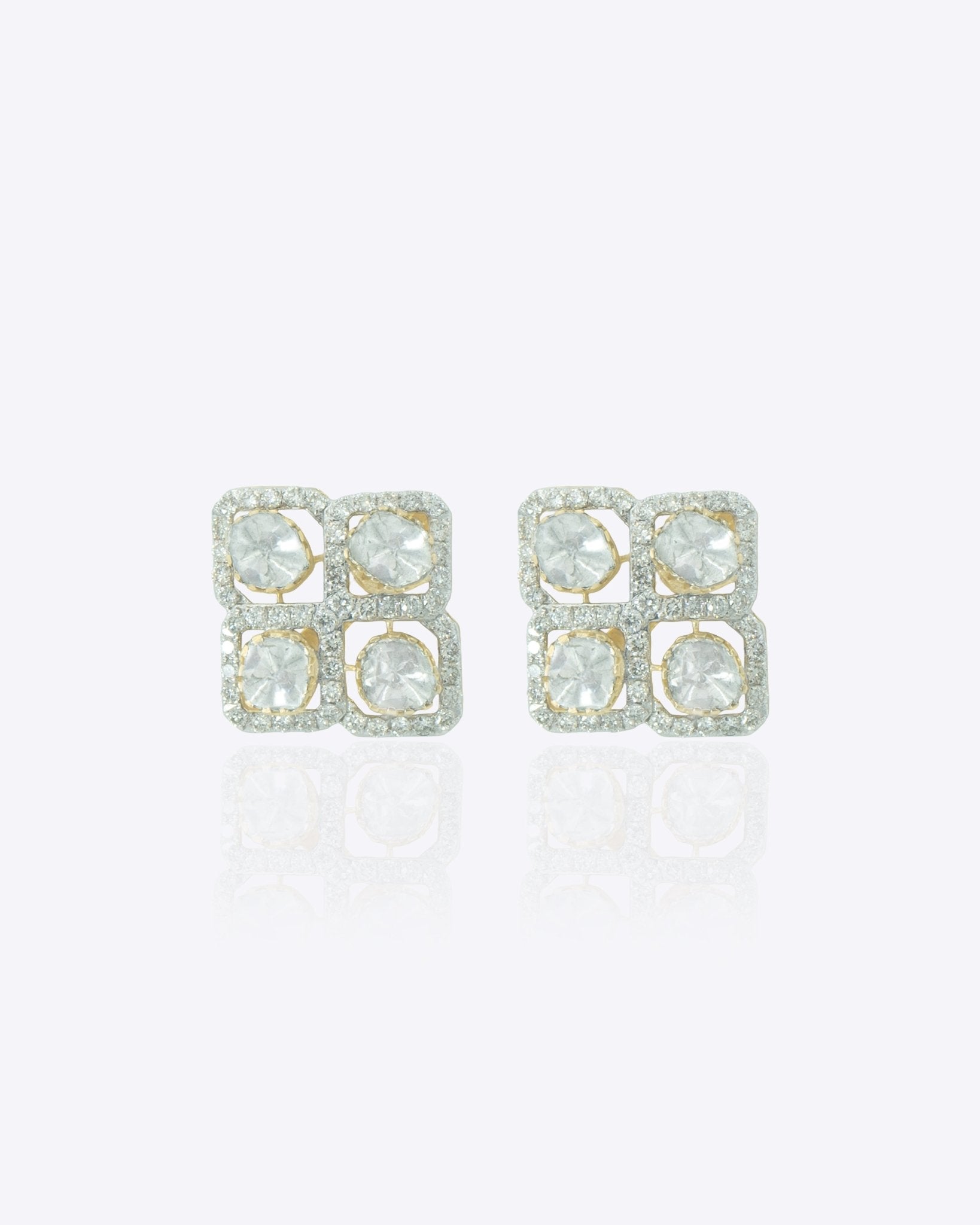 14K gold Orlina Studs with sparkling Polki and diamond detailing.