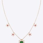 14K gold Polki Stone Floral Necklace with ruby, emerald, and Polki diamond accents.