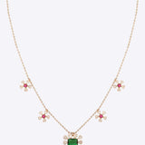 14K gold Polki Stone Floral Necklace with ruby, emerald, and Polki diamond accents.