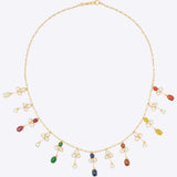 14k gold Navratna Symphony necklace with Polki diamonds and Navratna gems.