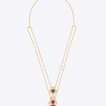 14k gold Mughal Muse necklace with Polki diamonds and ruby accents.