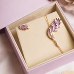 14k gold asymmetrical Polki earring set with a stud and earcuff