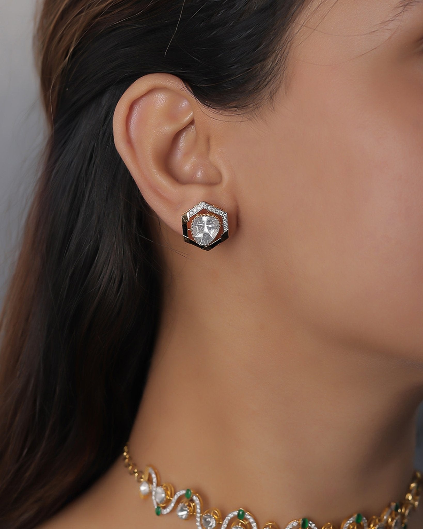 Ringlet Polki Studs in 14K gold with an oval polki and gold halo