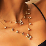 14k gold Papillon Dream Necklace with double-layered chain and Polki droplets.