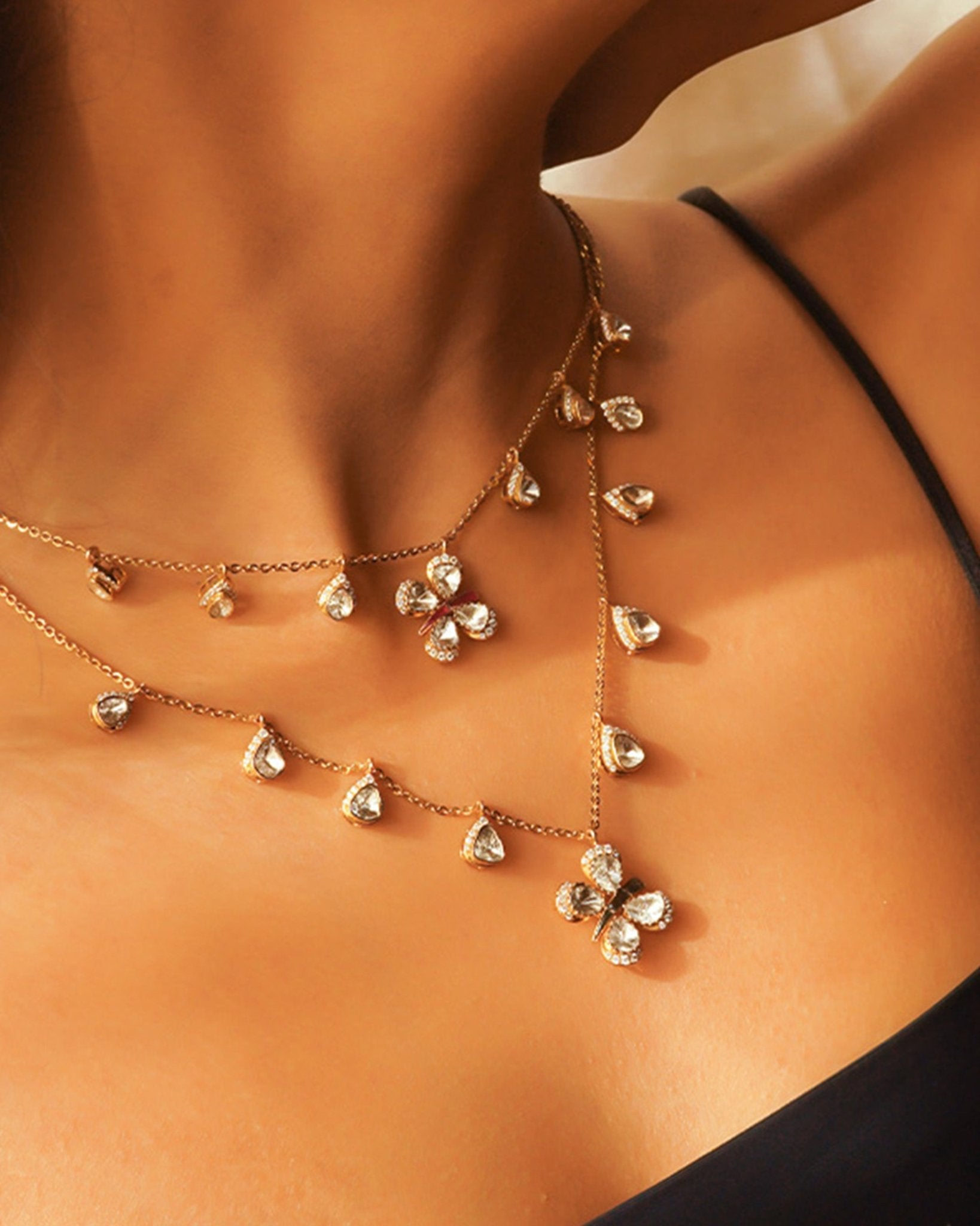 14k gold Papillon Dream Necklace with double-layered chain and Polki droplets.