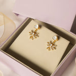 14K gold starburst-design jacket earrings set with Polki diamonds.